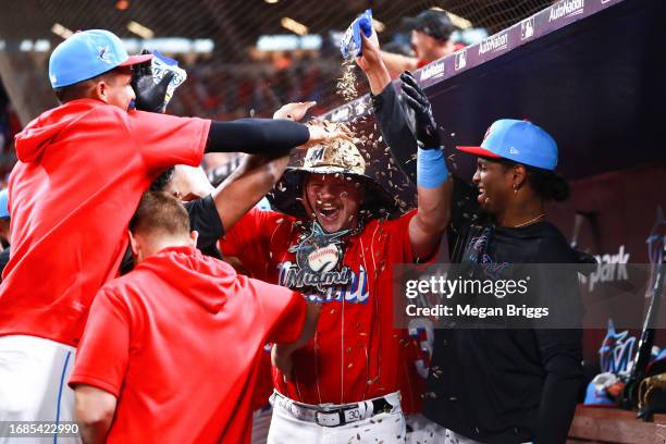 Jake Burger of the Miami Marlins celebrates after hitting a home run against the Atlanta Braves during the eighth inning at loanDepot park on...