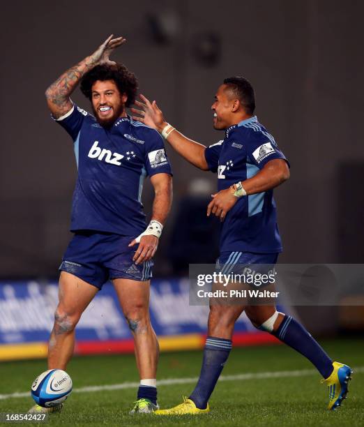 Rene Ranger of the Blues celebrates his try with Lachlan Mitchell during the round 13 Super Rugby match between the Blues and the Western Force at...