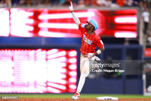 Jazz Chisholm Jr. #2 of the Miami Marlins rounds the bases after hitting a grand slam against the Atlanta Braves during the eighth inning of the game...