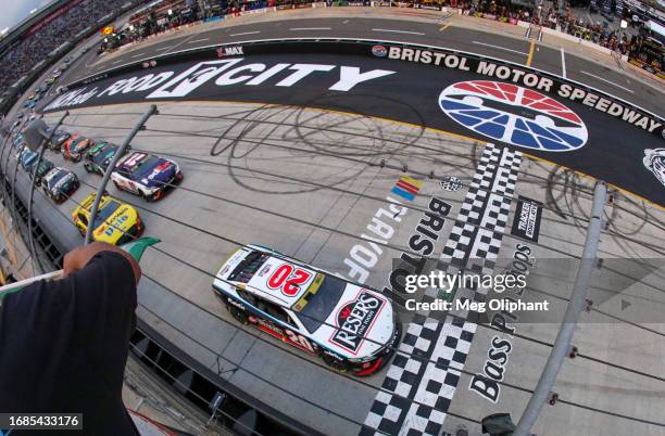 Christopher Bell, driver of the Reser's Fine Foods Toyota, leads the field to the green flag to start the NASCAR Cup Series Bass Pro Shops Night Race...