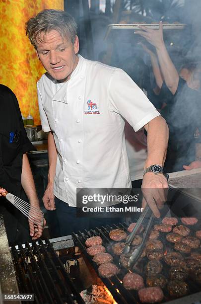 Television personality and chef Gordon Ramsay cooks at his Gordon Ramsay BurGR booth at Vegas Uncork'd by Bon Appetit's Grand Tasting event at...
