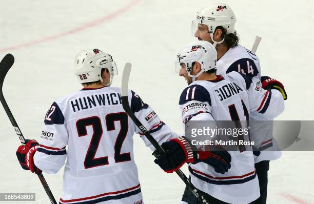 Stephen Gionta of USA celebrate with his team mates after he scores his team's 1st goal during the IIHF World Championship group H match between USA...
