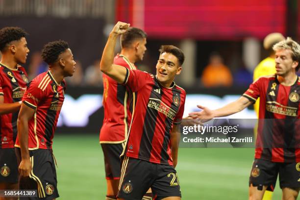 Tyler Wolff of Atlanta United celebrates with teammates after scoring a goal during the second half against Inter Miami CF at Mercedes-Benz Stadium...