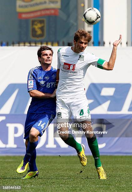 Artur Yusupov of FC Dynamo Moscow is challenged by Alyaksandr Martynovich of FC Krasnodar during the Russian Premier League match between FC Dynamo...