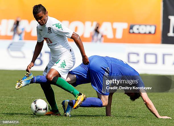 Marko Lomic of FC Dynamo Moscow is challenged by Wanderson of FC Krasnodar during the Russian Premier League match between FC Dynamo Moscow and FC...