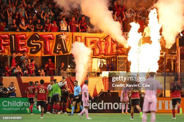 Giorgos Giakoumakis of Atlanta United celebrates with teammates after scoring a goal during the second half against Inter Miami CF at Mercedes-Benz...