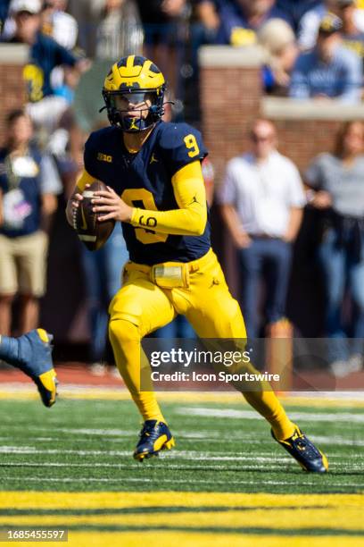 Michigan Wolverines quarterback J.J. McCarthy scrambles during the college men's football game between the Rutgers Scarlet Knights and the Michigan...