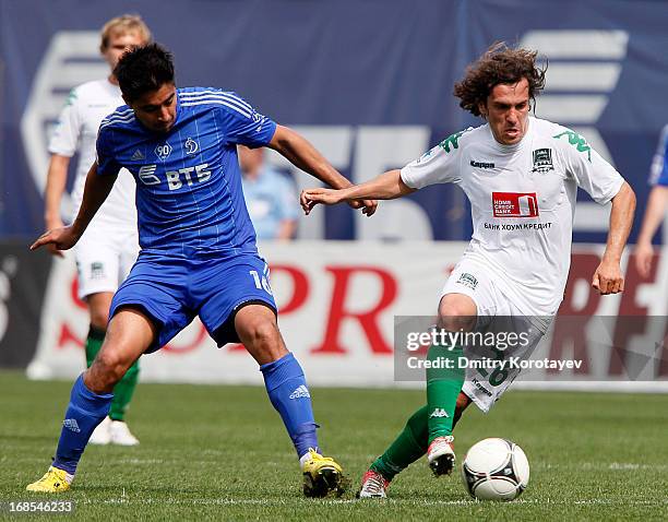 Christian Noboa of FC Dynamo Moscow is challenged by Marcio Abreu of FC Krasnodar during the Russian Premier League match between FC Dynamo Moscow...