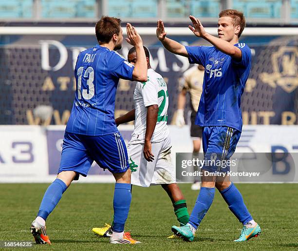 Aleksandr Kokorin and Vladimir Granat of FC Dynamo Moscow celebrate after scoring a goal during the Russian Premier League match between FC Dynamo...
