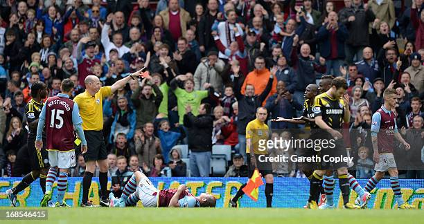 Ramires is sent off by referee Lee Mason during Barclays Premier League match between Aston Villa and Chelsea at Villa Park on May 11, 2013 in...