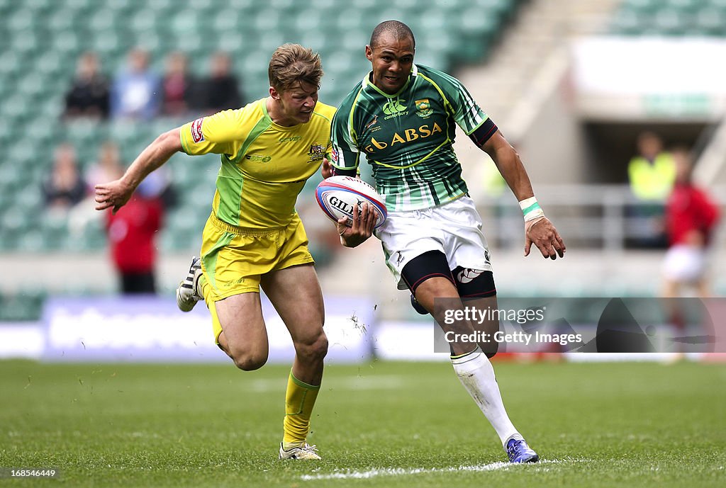Sam Figg Cornal Hendricks of South Africa breaks away from Sam Figg of... News ...