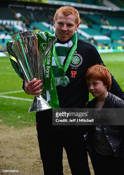 Celtic Manager Neil Lennon poses with the Scottish Premier League trophy and his son following the Clydesdale Bank Scottish Premier League match...