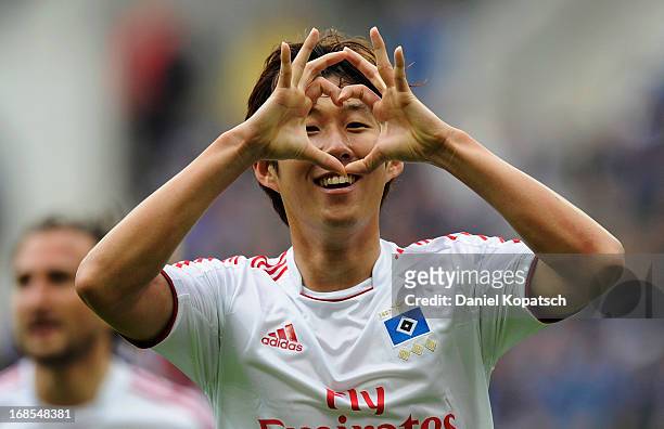 Heung-Min Son of Hamburg celebrates his team's first goal during the Bundesliga match between TSG 1899 Hoffenheim and Hamburger SV at...