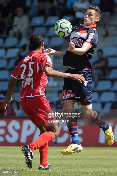 Monaco's midfielder Lucas Ocampos controls the ball on May 11, 2013 during the French L2 football match Nimes vs Monaco at the Costieres stadium in...