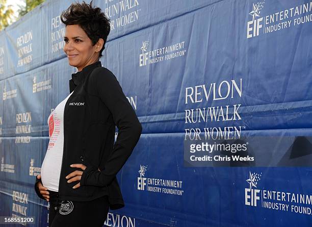 Revlon brand ambassador Halle Berry attends the 20th Annual EIF Revlon Run/Walk For Women at Los Angeles Memorial Coliseum on May 11, 2013 in Los...