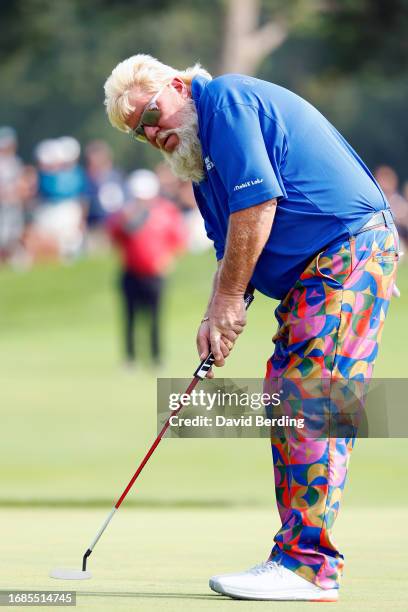 John Daly of the United States putts on the 16th hole during the second round of the Sanford International at Minnehaha Country Club on September 16,...