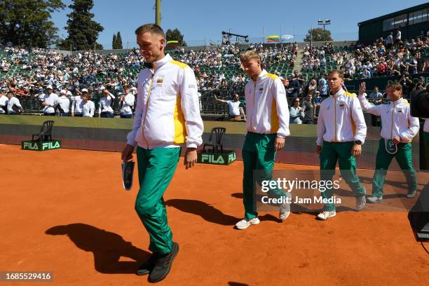 Vilius Gaubas, Ricardas Berankis, Edas Butvilas and Tadas Bebelis of Lithuania team walk prior a match during the World Group I game between...