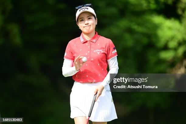 Yuna Nishimura of Japan acknowledges the gallery on the 3rd green during the final round of 54th SUMITOMO LIFE Vitality Ladies Tokai Classic at Shin...