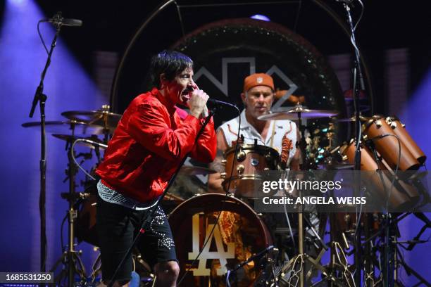 Red Hot Chili Peppers' members Anthony Kiedis and Chad Smith perform during the Global Citizen Festival at Central Park in New York City on September...