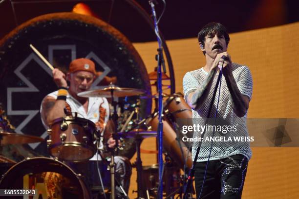 Red Hot Chili Peppers' members Anthony Kiedis and Chad Smith perform during the Global Citizen Festival at Central Park in New York City on September...