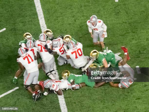 Ohio State Buckeyes running back Chip Trayanum scores the game winning touchdown during the college football game between the Ohio State Buckeyes and...