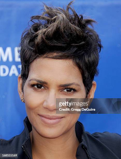 Actress Halle Berry arrives at the 20th Annual EIF Revlon Run/Walk For Women at Los Angeles Memorial Coliseum on May 11, 2013 in Los Angeles,...