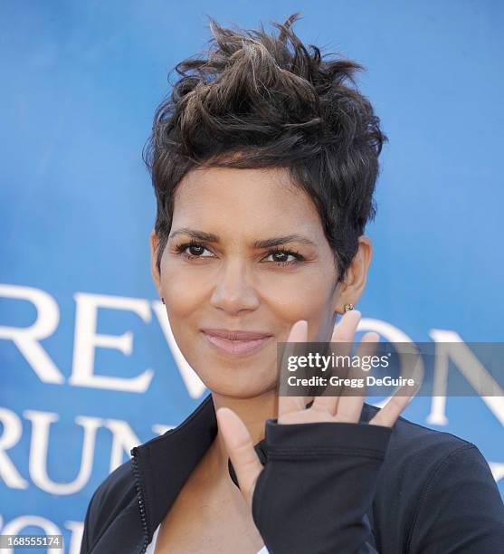 Actress Halle Berry arrives at the 20th Annual EIF Revlon Run/Walk For Women at Los Angeles Memorial Coliseum on May 11, 2013 in Los Angeles,...