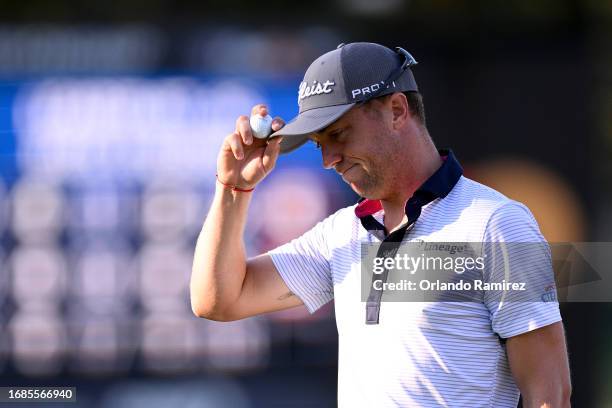 Justin Thomas of the United States reacts after putt on the 18th green during the third round of the Fortinet Championship at Silverado Resort and...