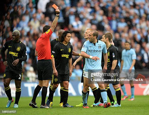 Pablo Zabaleta of Manchester City argues as he receives a red card from referee Andre Marriner during the FA Cup with Budweiser Final match between...