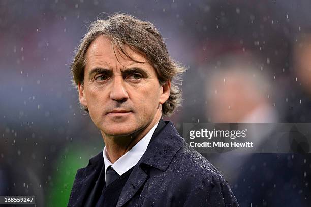 Manager Roberto Mancini of Manchester City looks dejected in defeat after the FA Cup with Budweiser Final between Manchester City and Wigan Athletic...