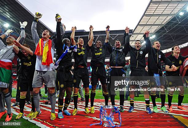 Emmerson Boyce of Wigan Athletic celebrates with team mates after victory in the FA Cup with Budweiser Final match between Manchester City and Wigan...