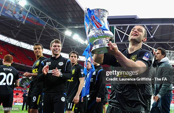 Shaun Maloney of Wigan Athletic celebrates with the trophy after victory in the FA Cup with Budweiser Final match between Manchester City and Wigan...