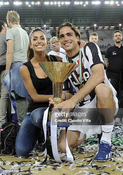 Alessandro Matri of Juventus FC and Federica Nargi celebrate with the Serie A trophy after the Serie A match between Juventus and Cagliari Calcio at...
