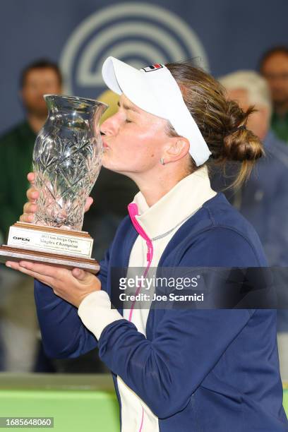 Barbora Krejcikova of Czechia poses with the trophy after finishing first place over Sofia Kenin of USA during the Cymbiotika San Diego Open at...