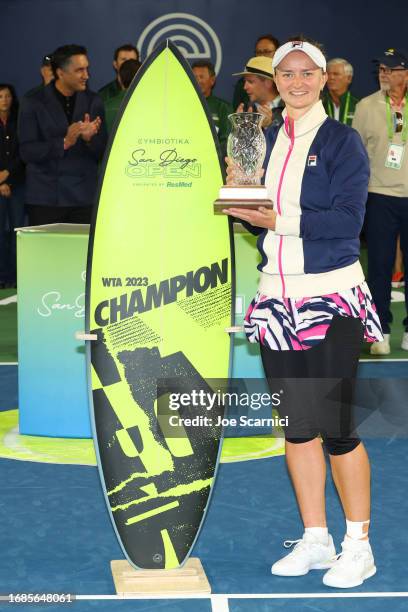 Barbora Krejcikova of Czechia poses with the trophy after finishing first place over Sofia Kenin of USA during the Cymbiotika San Diego Open at...