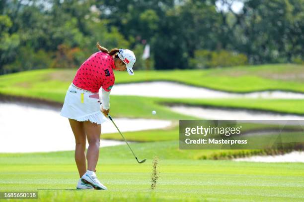 Rei Matsuda of Japan hits her third shot on the 8th hole during the final round of Sanyo Shimbun Ladies Cup at Tojigaoka Marine Hills Golf Club on...