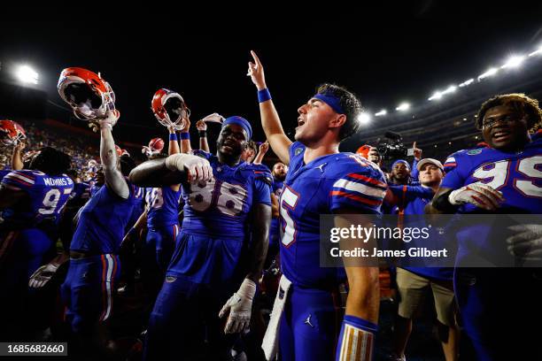 Graham Mertz of the Florida Gators celebrates with his team after a game against the Tennessee Volunteers at Ben Hill Griffin Stadium on September...