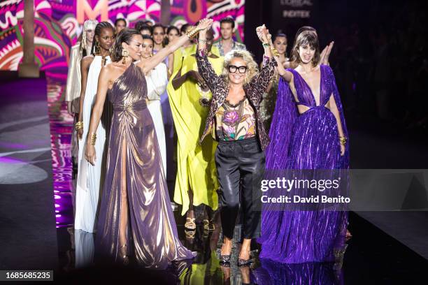 Nieves Alvarez and Maite walk the runway at the Lola Casademunt By Maite fashion show during the Mercedes Benz Fashion Week Madrid at Ifema on...