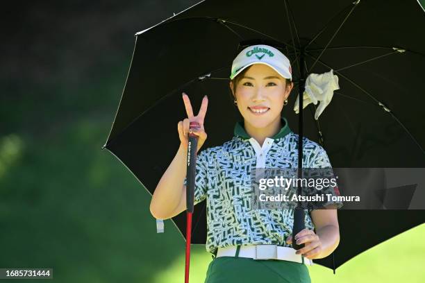 Ayako Kimura of Japan poses on the 8th hole during the final round of 54th SUMITOMO LIFE Vitality Ladies Tokai Classic at Shin Minami Aichi Country...