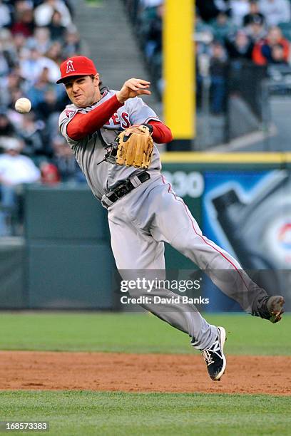 Brendan Harris of the Los Angeles Angels of Anaheim tries to make a play on an infield single off the bat of Tyler Greene of the Chicago White Sox...