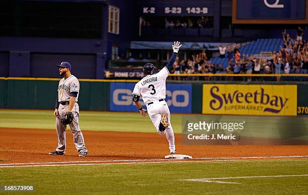 Infielder Evan Longoria of the Tampa Bay Rays hits a two run home run to win the game against the San Diego Padres at Tropicana Field on May 11, 2013...