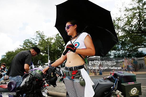 Paradegoer is seen on Allen Parkway during the 26th Annual Houston Art Car Parade on May 11, 2013 in Houston, Texas.