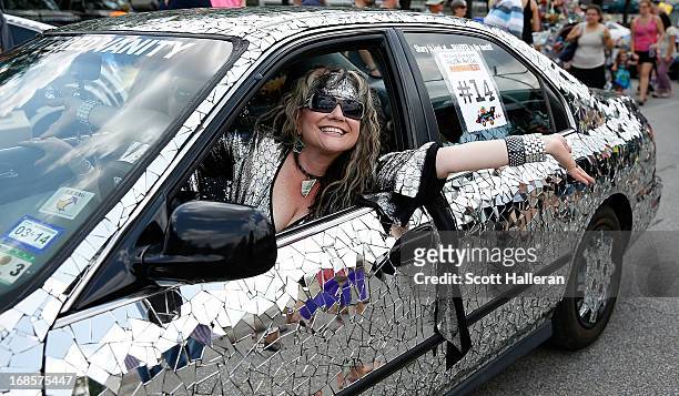 Paradegoer is seen on Allen Parkway during the 26th Annual Houston Art Car Parade on May 11, 2013 in Houston, Texas.