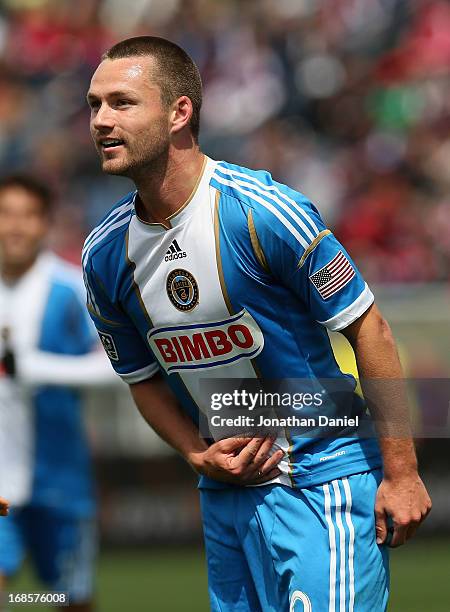 Jack McInerney of the Philadelphia Union takes a bow after scoring the game winning goal against Chicago Fire during an MLS match at Toyota Park on...