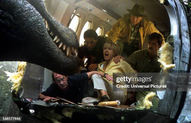 Tea Leoni, William H Macy and others scream at the sight of a dinosaur in a scene from the film 'Jurassic Park III', 2001.