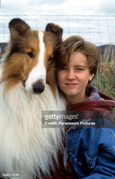 Tom Guiry and Lassie in a scene from the film 'Lassie', 1994.