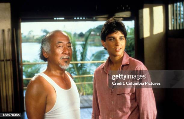 Pat Morita and Ralph Macchio in a scene from the film 'The Karate Kid', 1984.