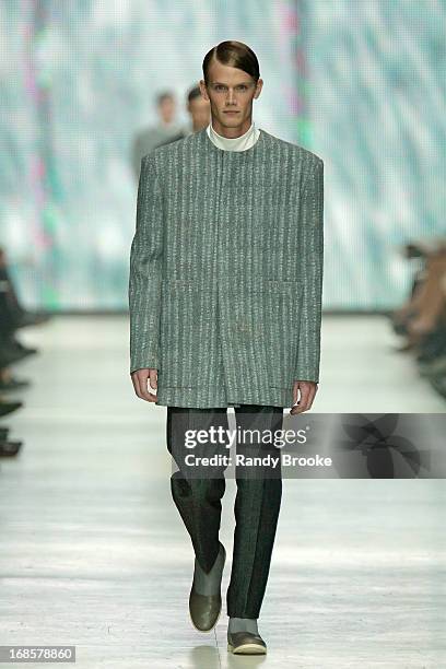 Model walks the runway wearing designs by Youngjin Shin and Hsin Lee at Palace of Fine Arts Theatre on May 9, 2013 in San Francisco, California.
