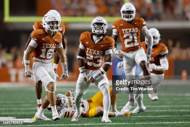 Jahdae Barron of the Texas Longhorns celebrates after tackling Wyatt Wieland of the Wyoming Cowboys in the second half at Darrell K Royal-Texas...