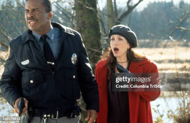 David Alan Grier and Bebe Neuwirth looking ahead in shock in a scene from the film 'Jumanji', 1995.